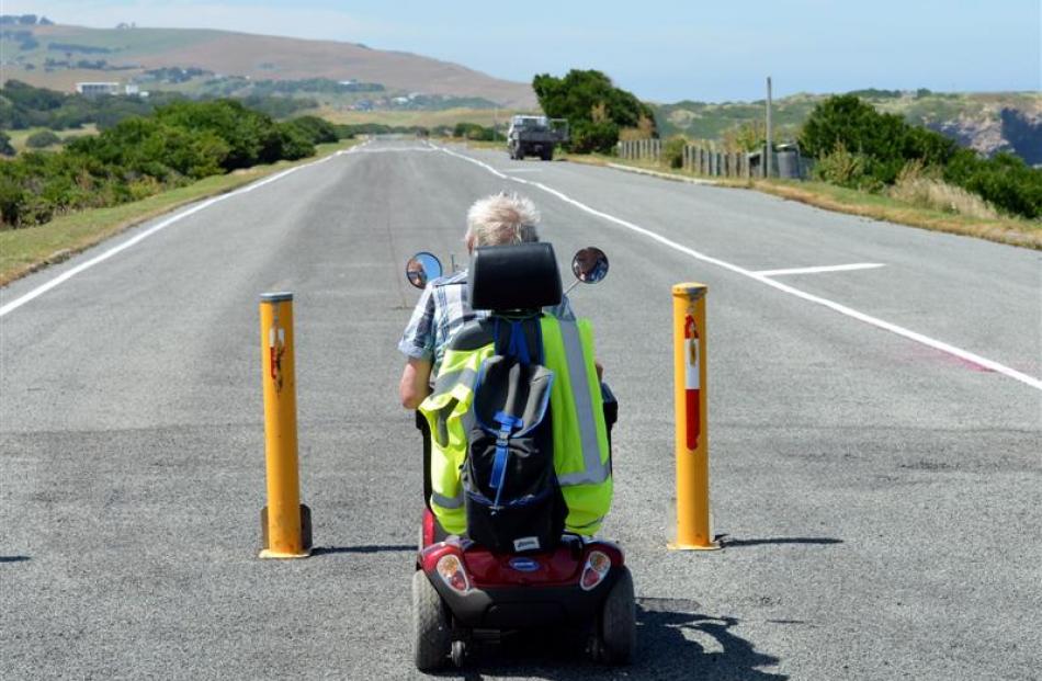 St Kilda  resident and mobility scooter rider Trevor Lawson takes in John Wilson Ocean Dr yesterday.