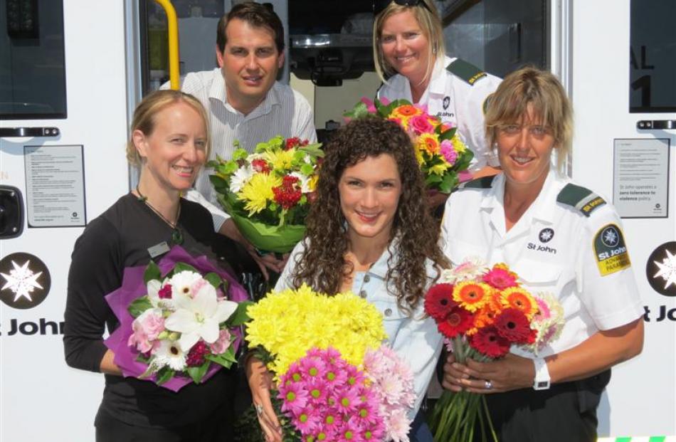 St Valentine's Day bouquet deliverers (from left) ASB senior customer service supervisor Jillian...