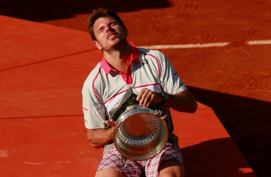 Stan Wawrinka celebrates after his victory over Novak Djokovic. Action Images via Reuters / Jason...