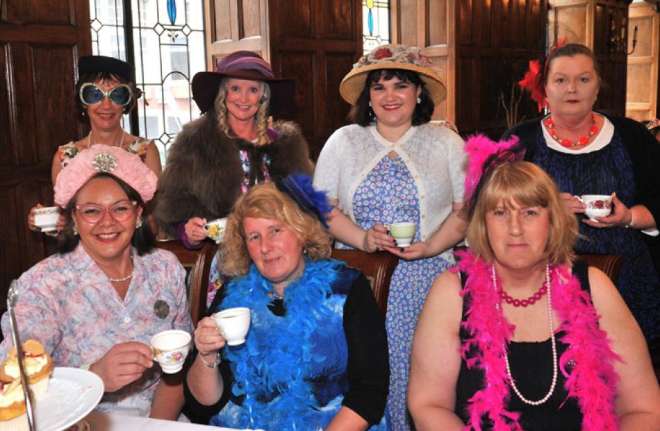 Standing (from left): Jill Cameron, Lee Blackie, Sarita Aldred and Karen Dawson.  Seated (from...