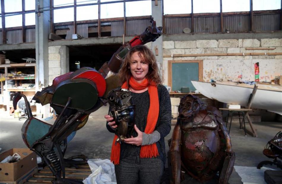 Steampunk HQ co-ordinator Jan Kennedy prepares for the opening on Friday of ''Recycled Relics'',...