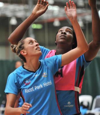 Steel defender Erena Mikaere (left) marks star team-mate Jhaniele Fowler-Reid during a training...
