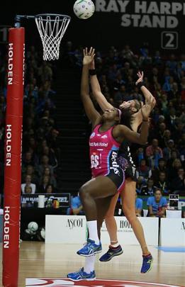 Steel goal shoot  Jhaniele Fowler-Reid (left) and Magic goal keep  Leana de Bruin compete for the...