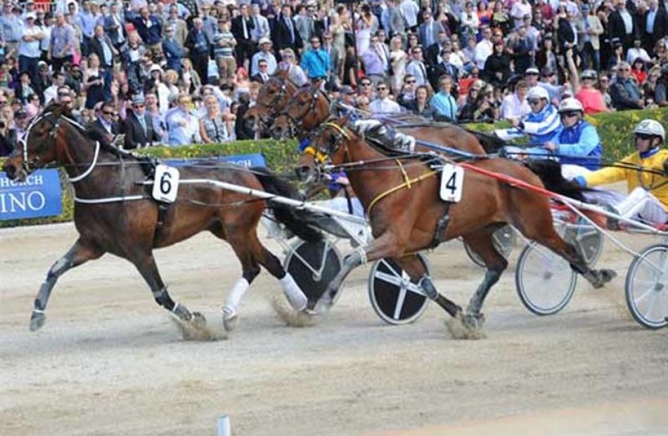 Stent, driven by trainer Colin De Filippi, wins the New Zealand trotting free-for-all from Shemon...