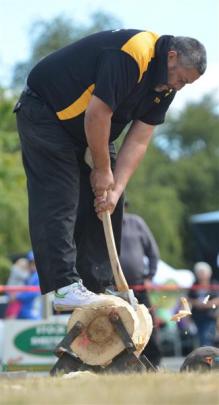 Steve Unahi, of Winton, competes in the wood chopping exhibition. Photos by Peter McIntosh.