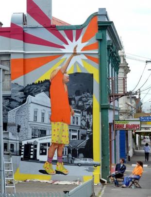 Stickum artists Guy Howard-Smith and Aroha Novak admire the new  Reaching for the Stars mural in...