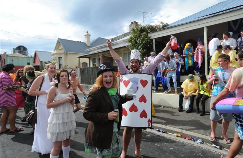 Students in Wonderland . . . University of Otago students at the Hyde St keg party on Saturday.