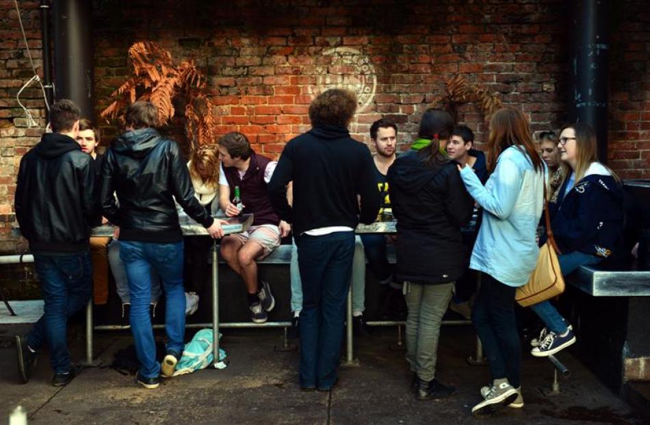 Students gather at the Captain Cook Tavern in Dunedin last Friday to mark the popular student pub...