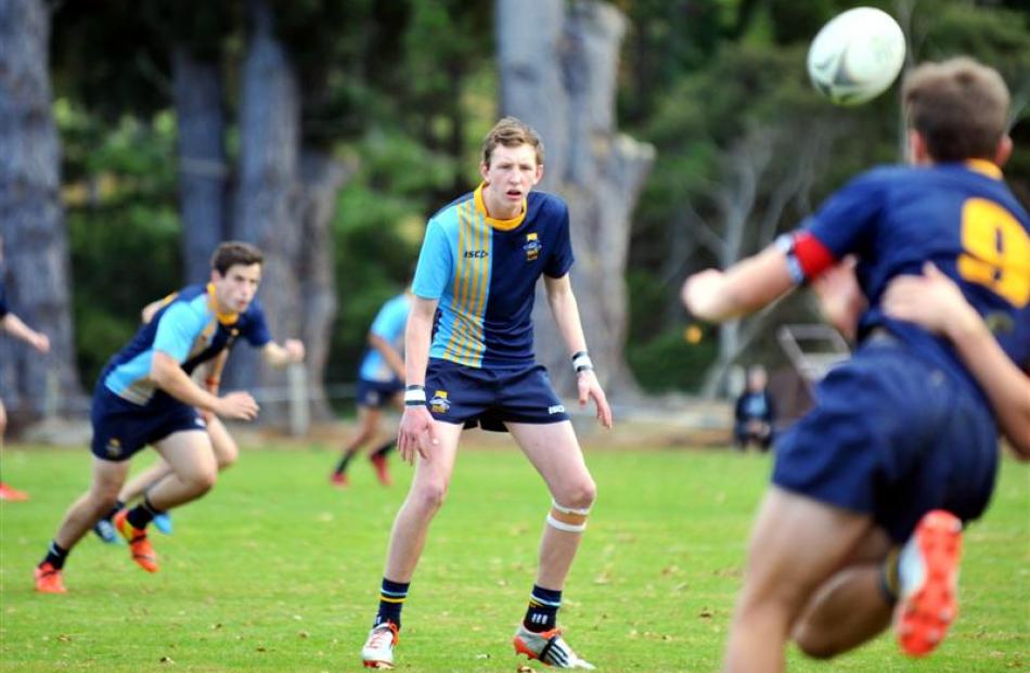 Taieri College first five-eighth Callum Smeaton waits for a pass from halfback Tane Marshall...