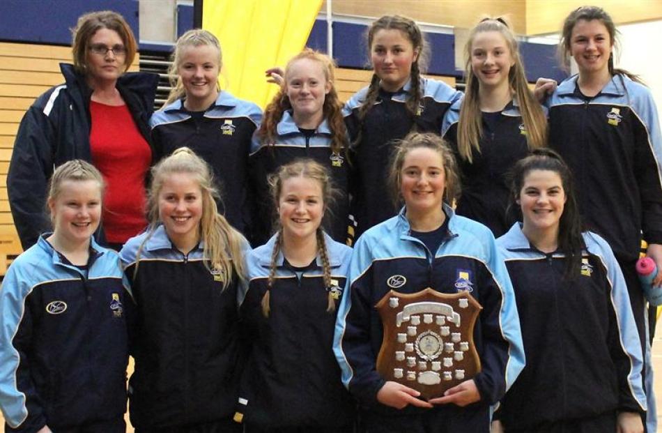Taieri College's year 10 netball team celebrates winning the intermediate grade at the Otago...
