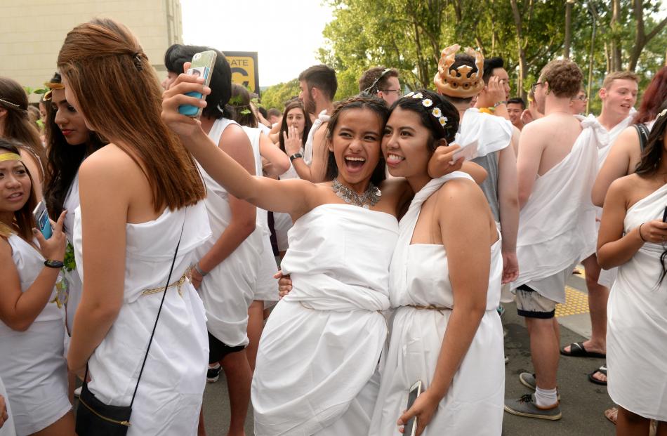 Taking a selfie at the toga party were Dennise Palpallatoc (left) and Alessandra Paras from...