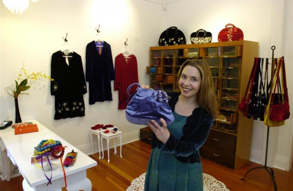 Tamsin Cooper inspects part of her summer range, in her Dunedin studio and workshop. Photo by...