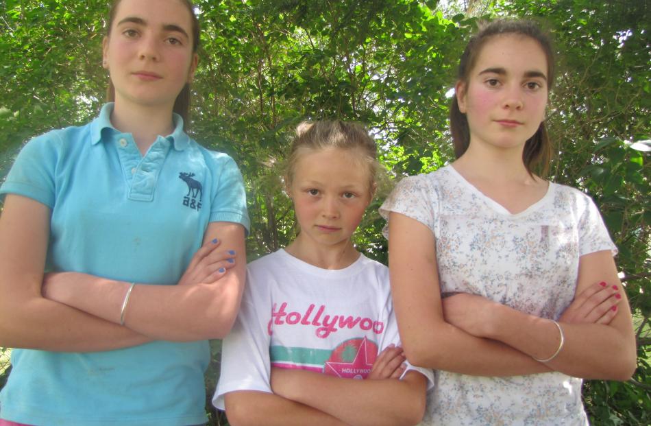 Tarras School pupils Penelope Chapman-Cohen (13), Billie Wilson (9)and Charlotte Chapman-Cohen ...