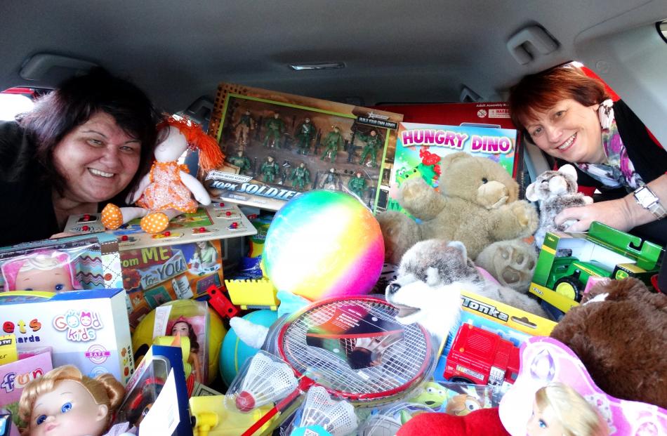 Te Whare Pounamu Dunedin Women's Refuge manager Krissie Anderson (left) and Cooke Howlison Toyota...