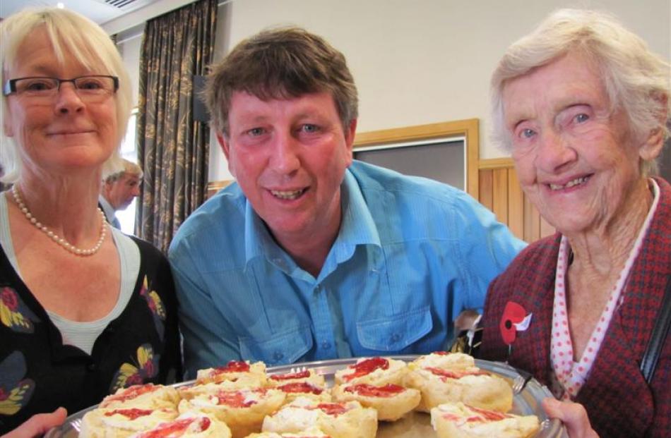 Tempting Myrtle Whittington with scones at the Anzac Day Diggers Breakfast in Wanaka yesterday...