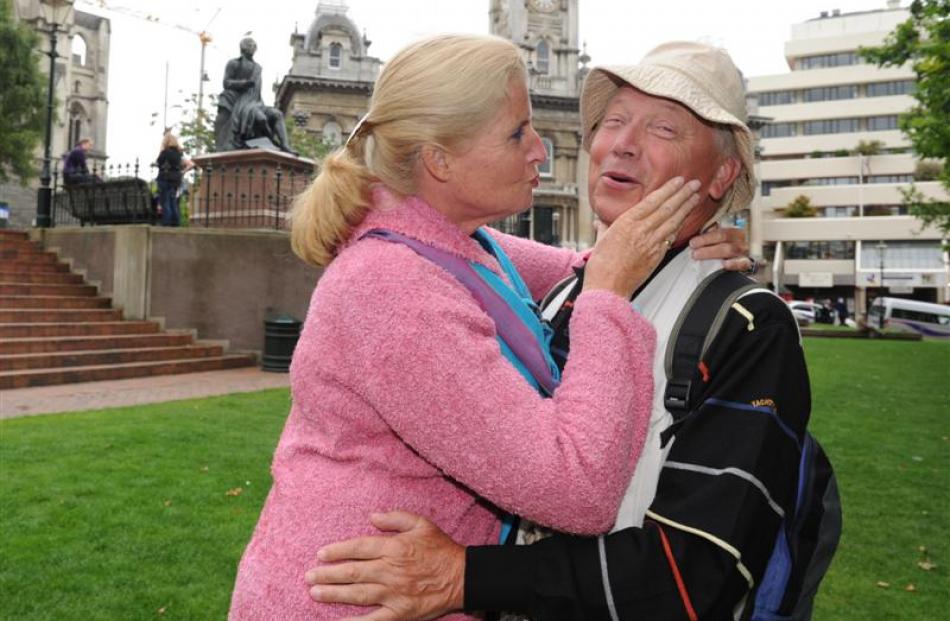 Tessa and Frans Visser, of Holland, kiss and cuddle in the Octagon yesterday during their tour of...