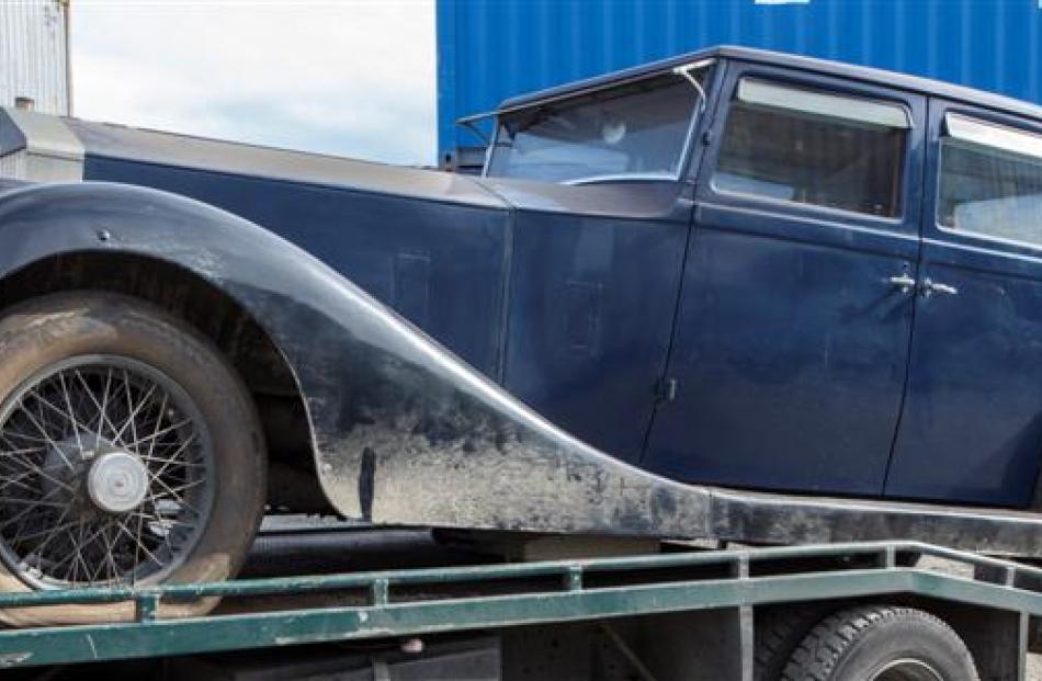 The 1922 Rolls-Royce Silver Ghost belonging to Michael Swann is trailered to a secure location...