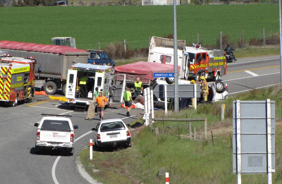 The aftermath of a triple fatality on State Highway 6, near Luggate, yesterday. Photos by Mark...