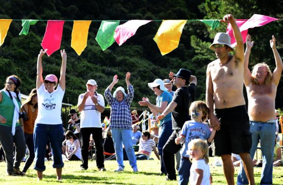 The appreciative crowd dance at the Waitati Music Festival on Saturday.