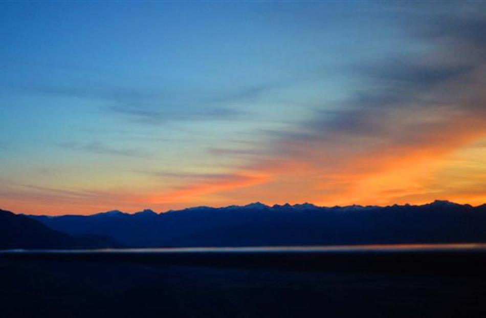 The ash cloud from the Chilean volcano makes for a spectacular sunset above the Southern Alps on...