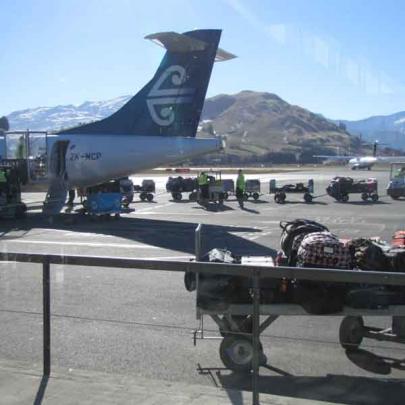 The baggage handlers and airport crew, pictured here servicing an Air New Zealand Link ATR-72,...