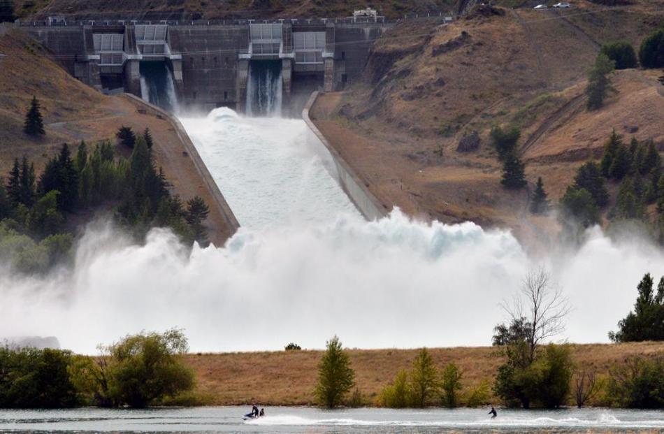 The Benmore and Clyde Dams, both spilling at full force in early 2013. PHOTOS: ODT FILES