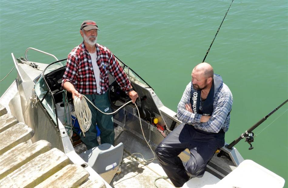 The boaties, safe and sound after the capsize at Taieri Mouth yesterday. Photos: Stephen Jaquiery
