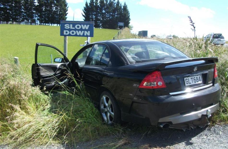 The car which hit a fence in yesterday's crash north of Waihola. Photo supplied.