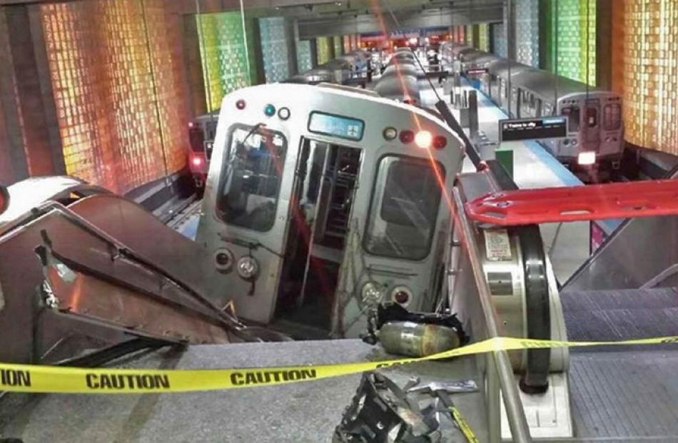 The Chicago Transit Authority train car rests on an escalator at the O'Hare Airport station after...