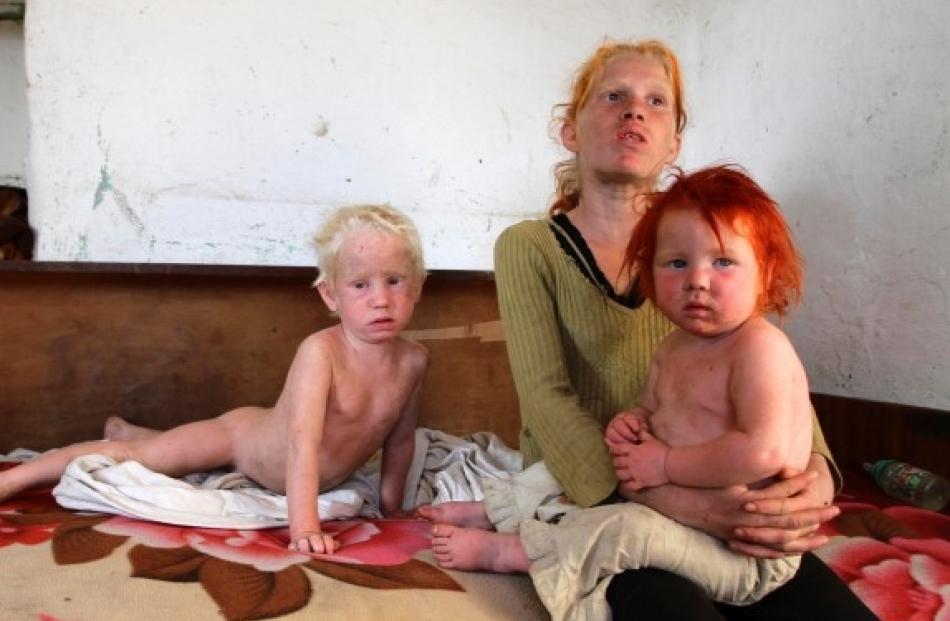 The children of Roma woman Sasha Ruseva (not pictured) inside their home in Nikolaevo, southern...