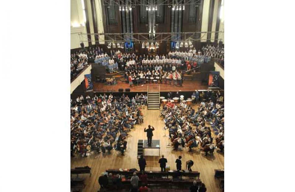 The Combined Choir and Orchestra perform God Defend New Zealand during the 40th Otago Secondary...
