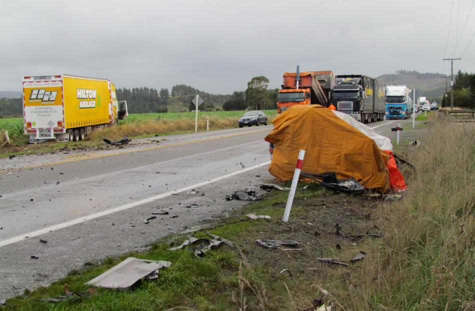 The covered Land Rover Freelander (right) in which a Waianakarua man was kllled early today and...