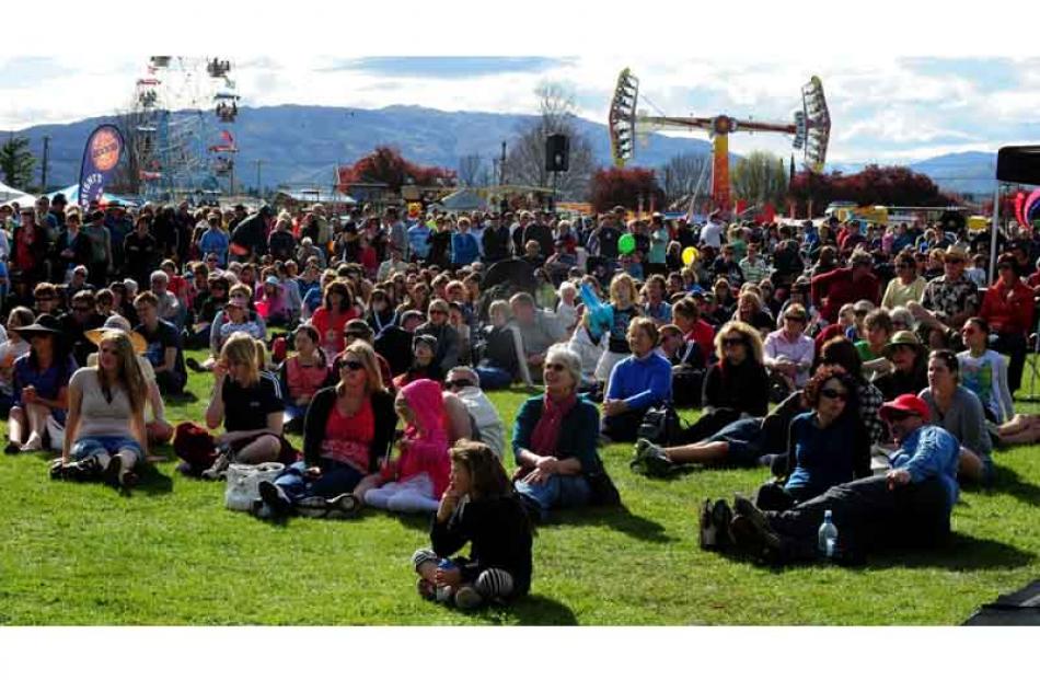 The crowd enjoys the entertainment in  Pioneer Park on "Saturday in the Park" during the 2009...