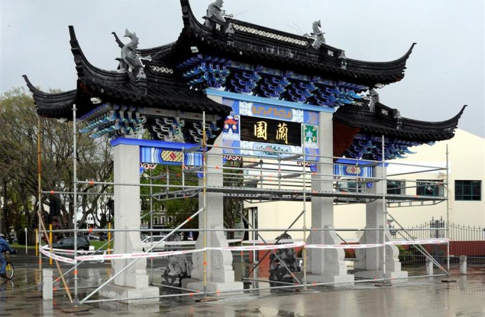 The Dunedin Chinese Garden entrance is surrounded by scaffolding, following the discovery of...