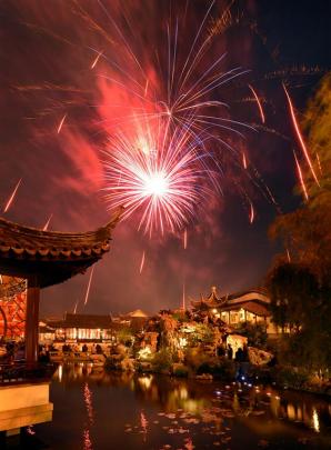 The final flurry of the night’s fireworks display dazzles above the Dunedin Chinese Garden. Photo...