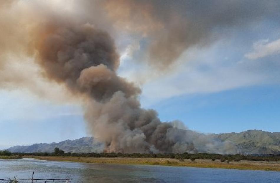 The fire on an island in the Waitaki River. Photo supplied.