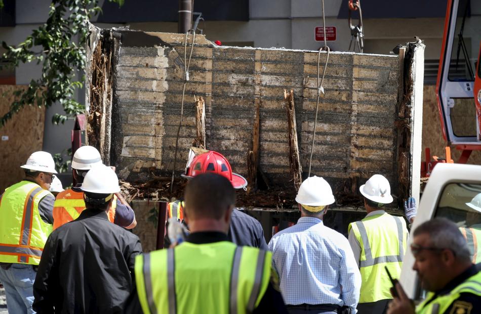 The floor section of the balcony has been removed for testing. Photo: Reuters