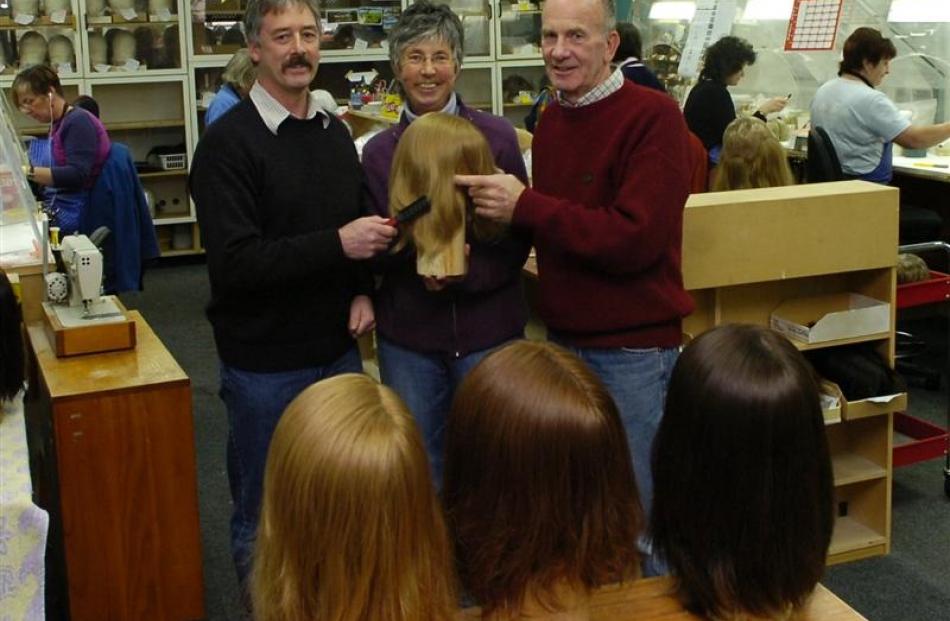 General manager Steve Conley and company founders Averill and Murray Barrington on the factory...