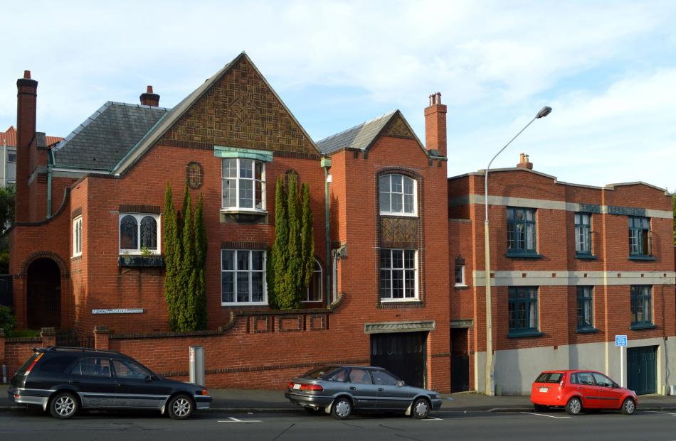 The house (left) seen from across Stuart St.