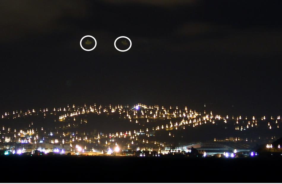 The image captured by Terence Huang, featuring the unexplained objects over Otago Harbour on...