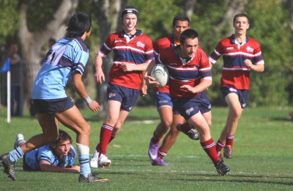 The Kavanagh fullback charges upfield against King's in their Highlanders 1st XV game at King's...