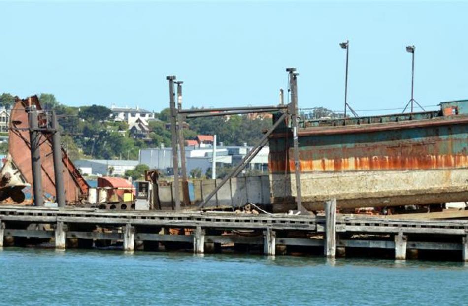 The last of the former steam powered dredge Te Whaka on the Birch St slip yesterday. Photos by...