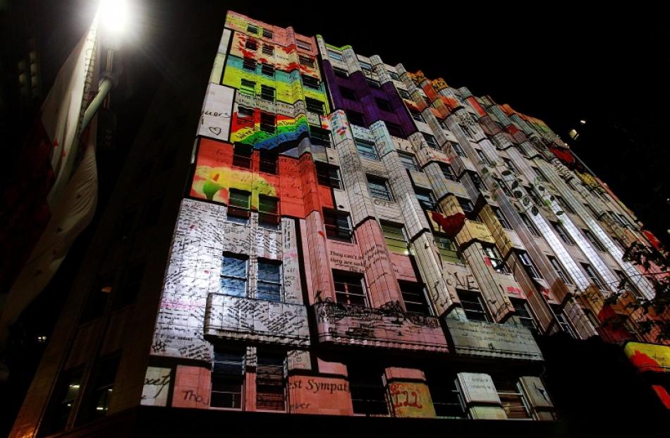 The Lindt cafe was lit up for the anniversary of the fatal siege that happened there. Photo:...