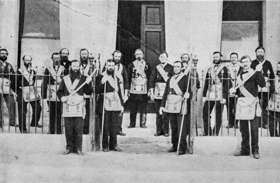 The Masonic Lodge at Clyde in the early days. Among those in the back row are (from left): W....