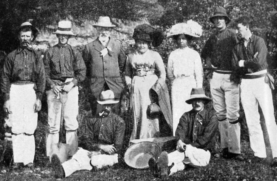 The Mayor and Mayoress of Lawrence, Mr and Mrs J. Robertson, with a group of miners at Ross...