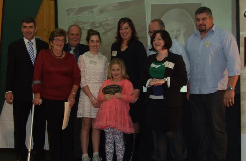 The Moore family, of Pukepito and Berwick, receive their sesquicentennial (150 year) award at the...