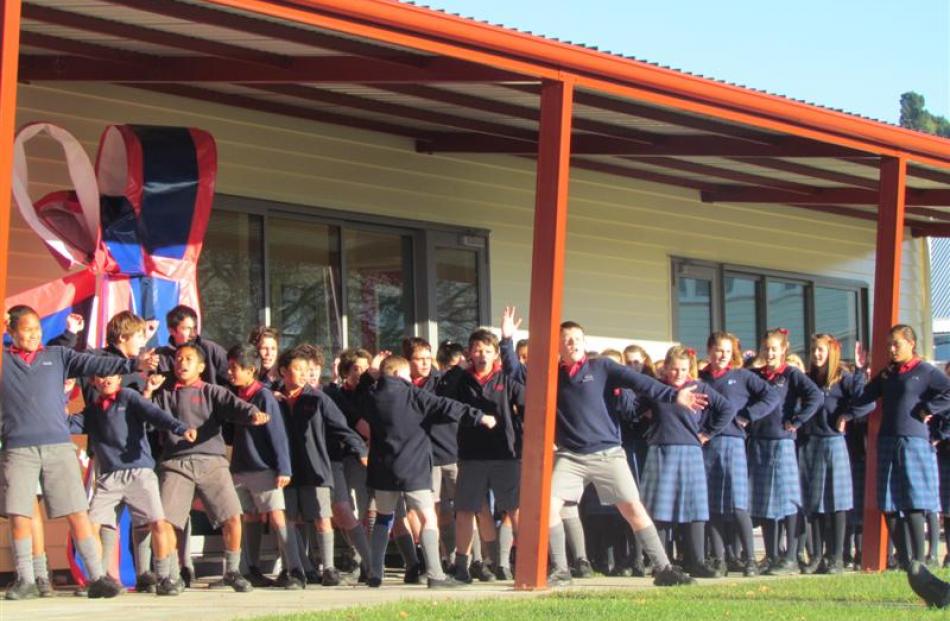 The Oamaru Intermediate School's kapa haka group performs a haka to  mark  the official opening...