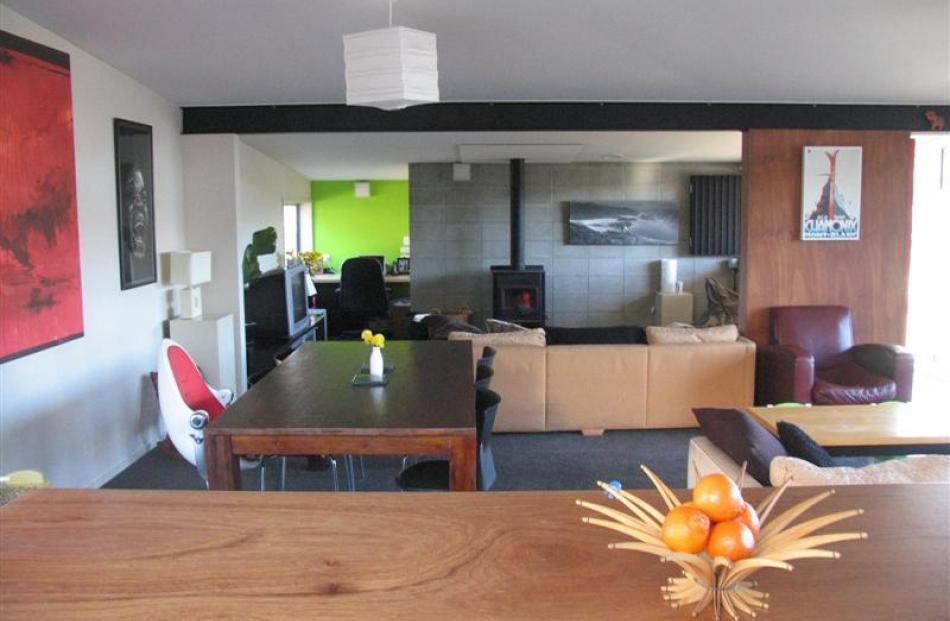 The open-plan kitchen and living area forms the hub of the home.