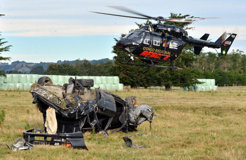 The Otago Regional Rescue Helicopter carrying a seriously injured person leaves the secne of an...