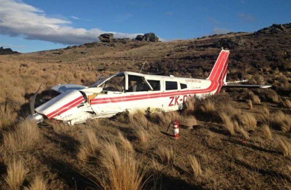 The  Piper  Cherokee after it crashed near Poolburn. Photo by NZ Police.